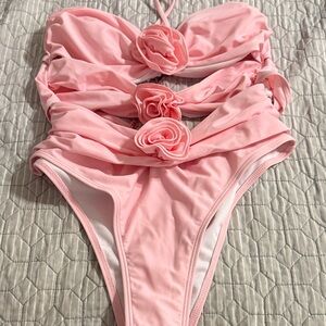 New baby pink swimsuit.